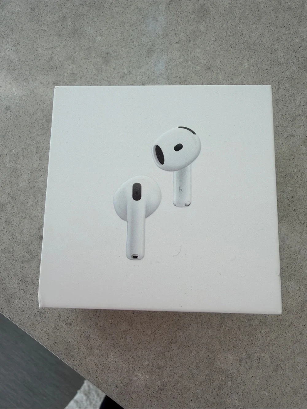 Apple AirPods 4 with active noise cancellation and charging case
